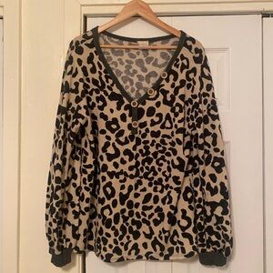Long sleeve leopard print sweater shirt.
